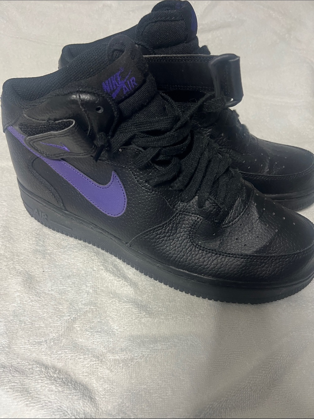 Nike Black High-Top Sneakers with Purple Swoosh